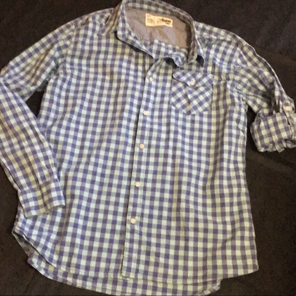 Man’s plaid shirt long sleeves urban pipeline